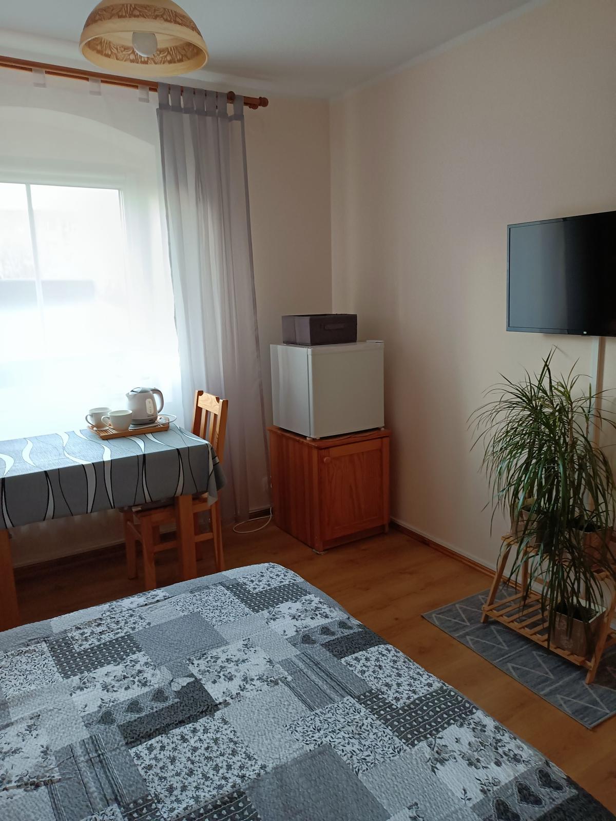 Pokoje w centrum Mikołajek